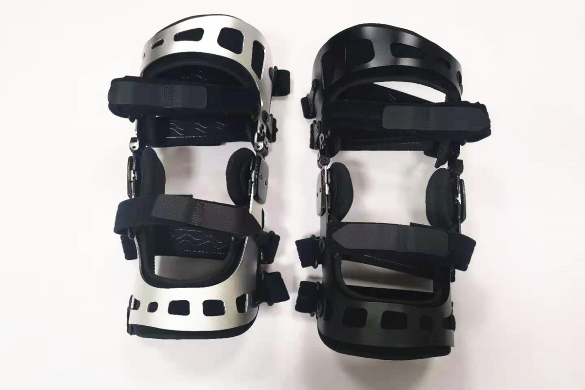 offloading dual OA knee brace support